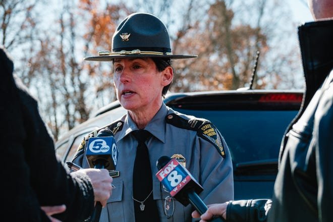 Laura Taylor, New Philadelphia post commander of the Ohio State Highway Patrol, talks with the media Tuesday, Nov. 14 outside Tuscarawas Valley Middle/High School in Zoarville, Ohio.